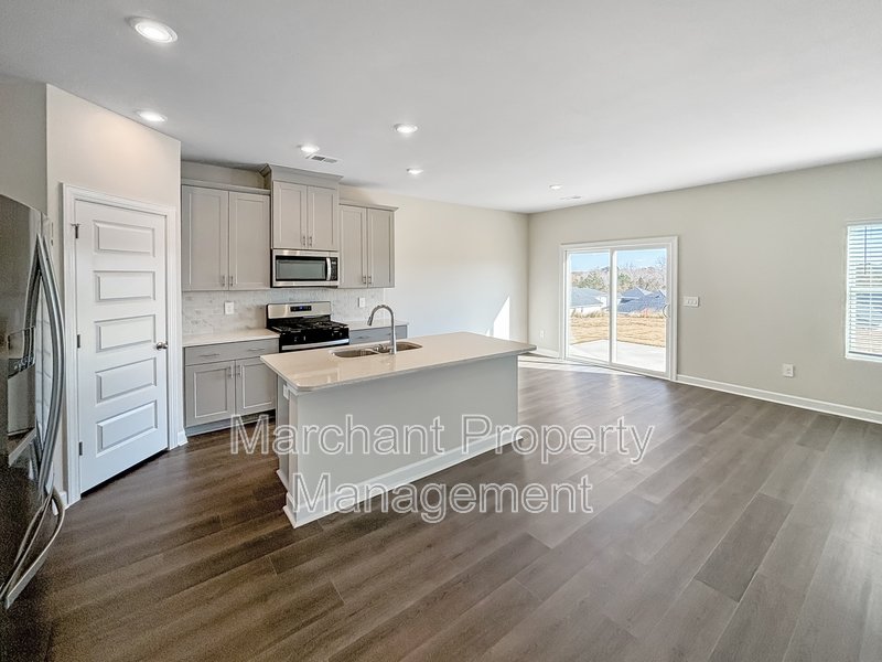 Brand-new modern home with patio, perfect for entertaining property image