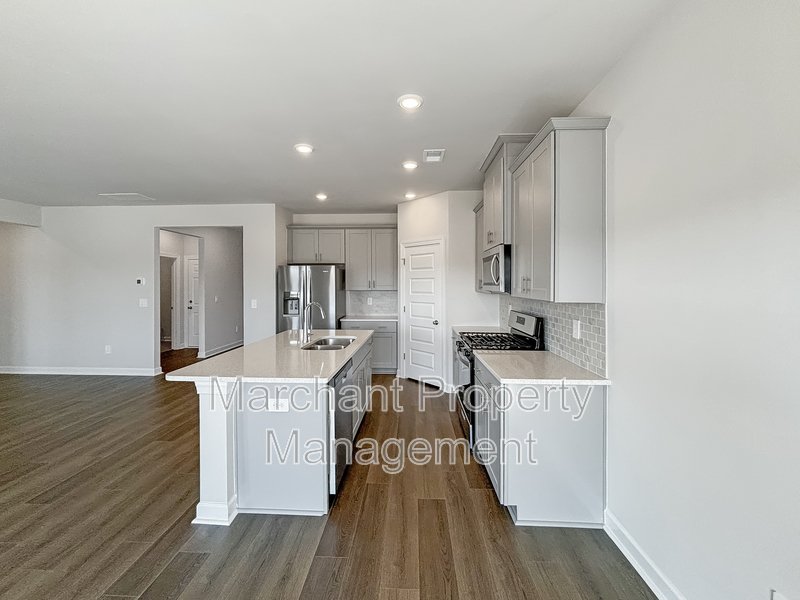 Brand-new modern home with patio, perfect for entertaining property image