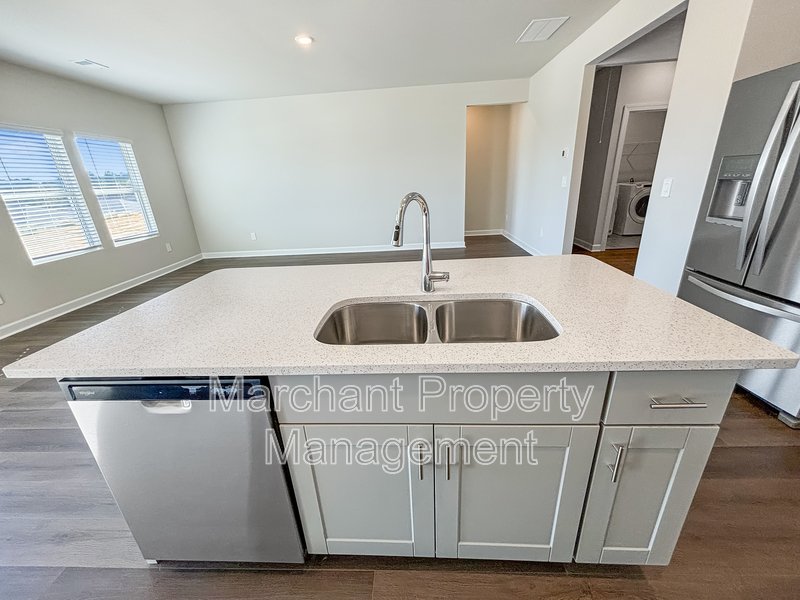 Brand-new modern home with patio, perfect for entertaining property image