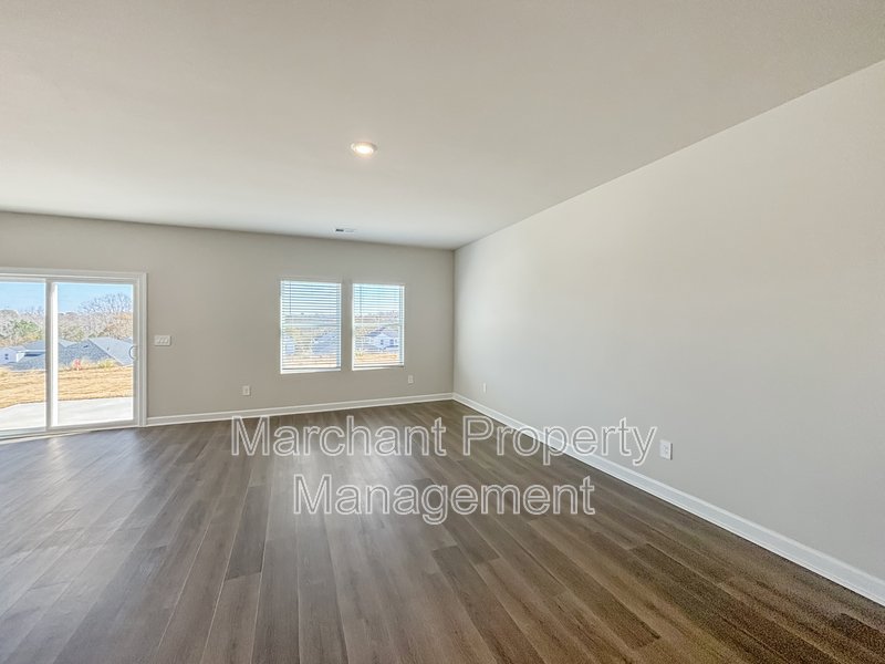 Brand-new modern home with patio, perfect for entertaining property image