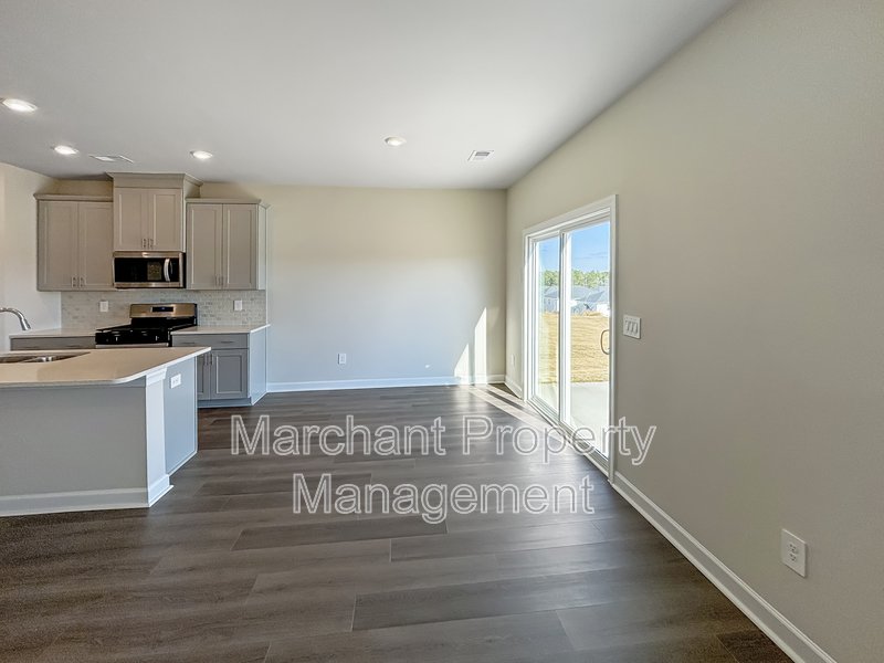 Brand-new modern home with patio, perfect for entertaining property image
