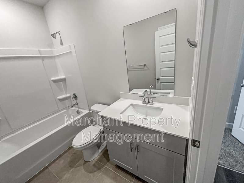 Brand-new modern home with patio, perfect for entertaining property image