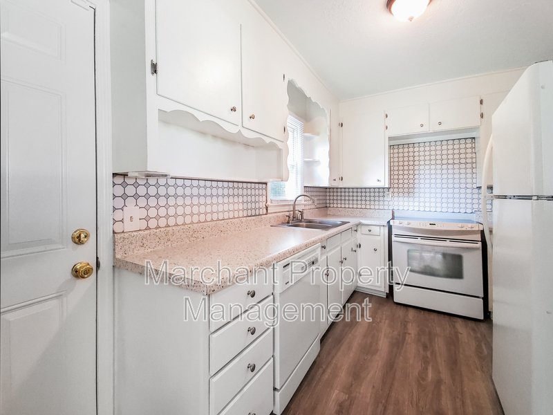 Completely updated 3BR/1.5BA brick home with one car carport property image